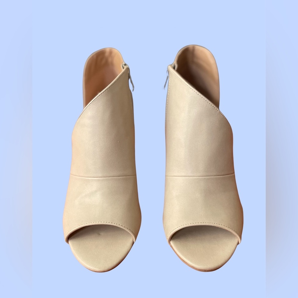 Cream asymmetrical 2.5 inch booties